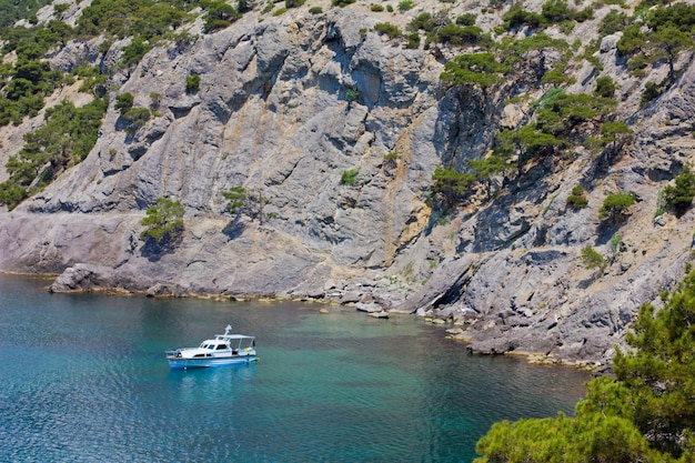 White yacht in the blue bay