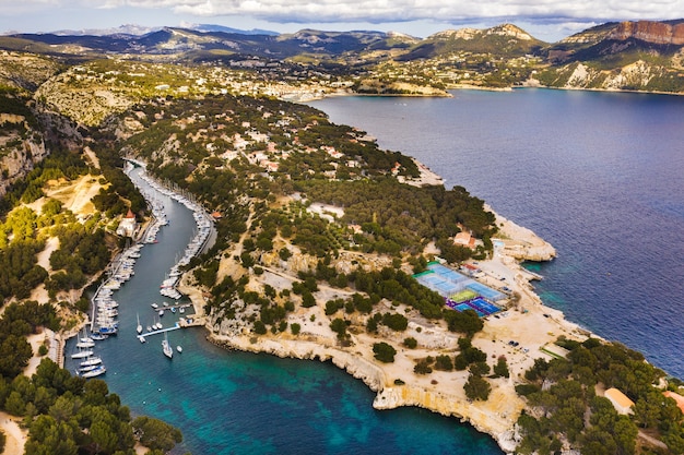 White yachts in Calanque de Port Miou, one of biggest fjords between Marseille and Cassis, France.