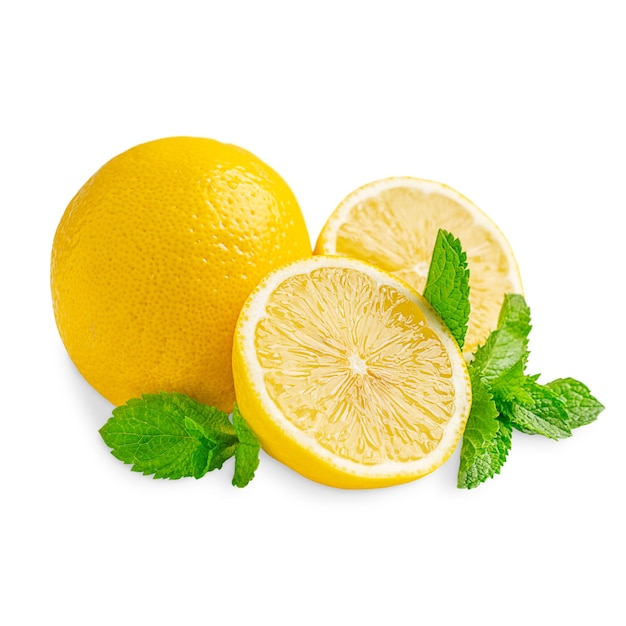 Whole and halved sour ripe lemon fruits and fresh mint leaves on white used as cocktail ingredients