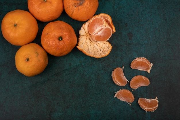 Whole or partial oranges in dark light