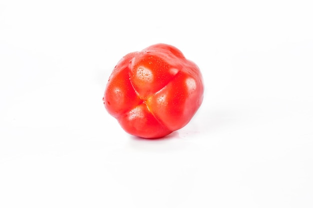 Whole ripe sweet red pepper isolated on white background Copy space