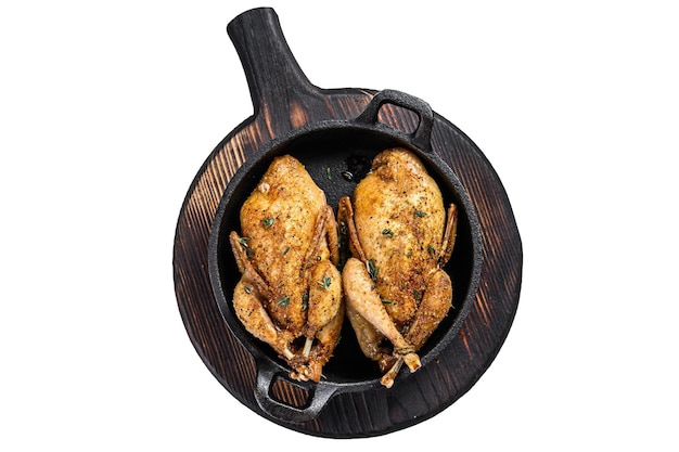 Whole roast quails in a pan Isolated on white background