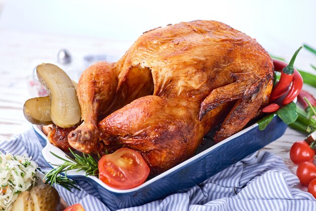 Whole roasted chicken with vegetables