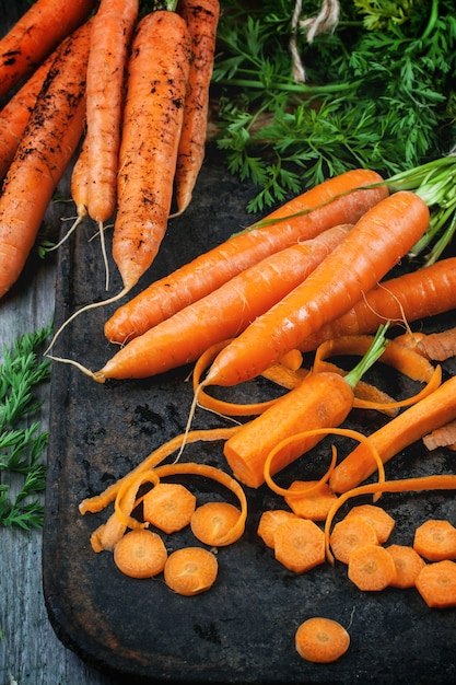 Whole and sliced carrots