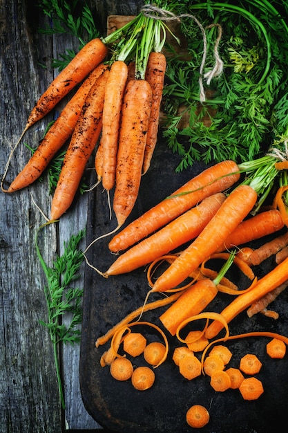 Whole and sliced carrots