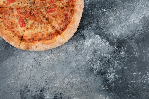 Whole tasty margherita pizza placed on marble surface. High quality 3d illustration