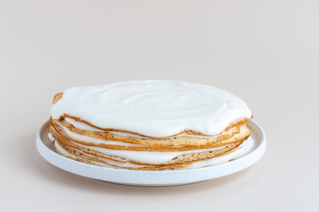 Whole vanilla crepe cake on a plate gluten free not decorated mockup