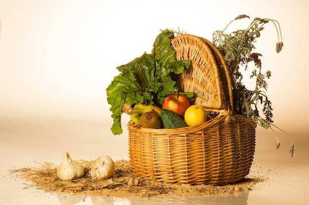 Wicker basket full of fruits and vegetables