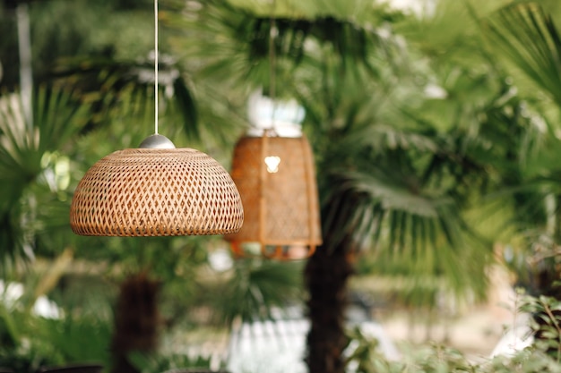 Wicker lampshade in an outdoor street cafe vintage decorative