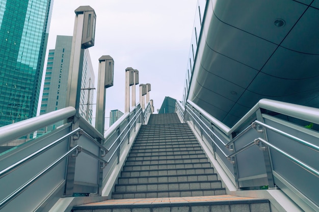 Wide stairs exterior between modern skyscrapers