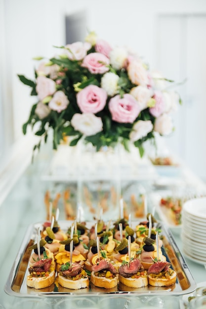 A wide variety of snacks on the table for guests Shrimp boiled pork various types of meat and other products