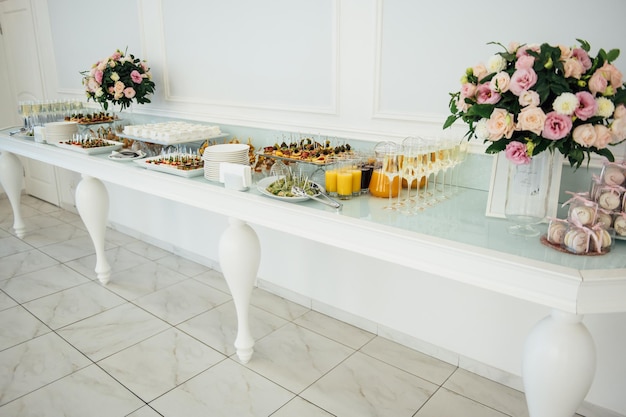 A wide variety of snacks on the table for guests Shrimp boiled pork various types of meat and other products