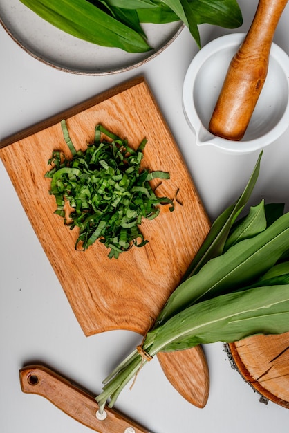 Wild garlic Wild garlic on a wooden board on a table