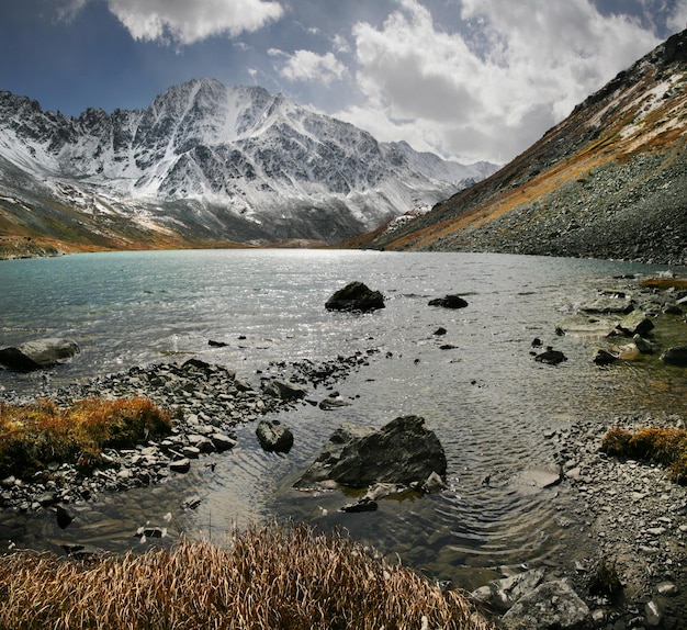 Wild mountain lake cloudy autumn weather