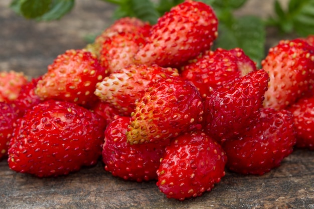 wild strawberries on wood