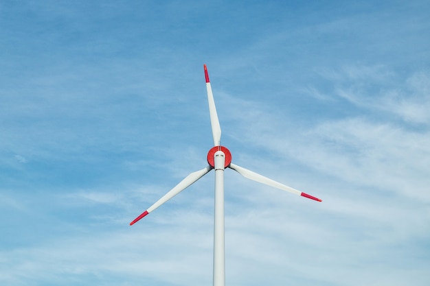 Wind generators turbines and blue sky.