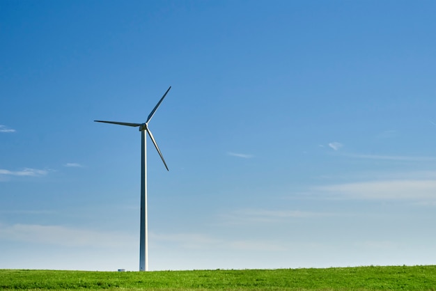 Wind turbine in green field