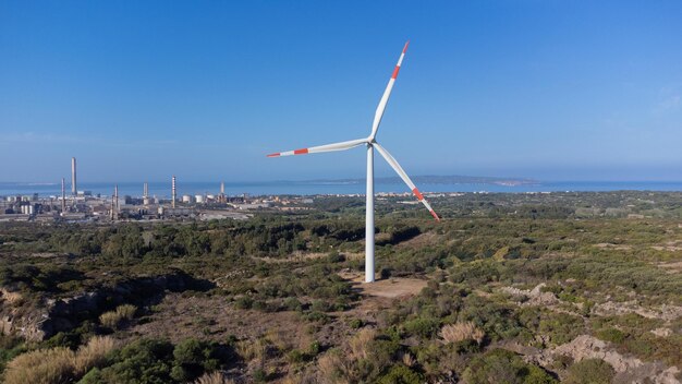 Photo wind turbine moving in the wind farm in sardinia