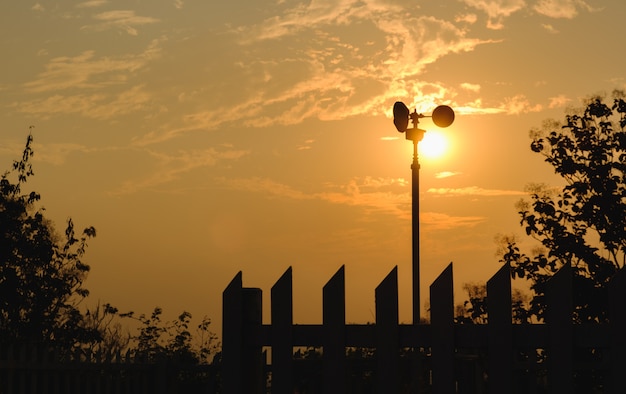 Wind turbine, silhouette in sunset and sunrise