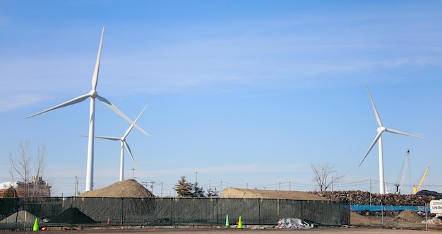 wind turbine standing tall against a clear blue sky symbolizing sustainability renewable energy a