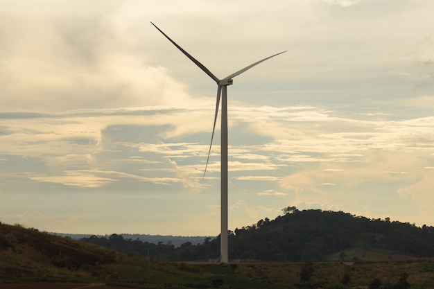 Wind turbine with the light of sunset. Alternatively referred to as a wind energy converter. 