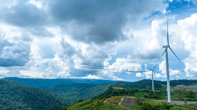 Wind Turbines Windmill Energy Farm Windmill on blue sky puffy clouds