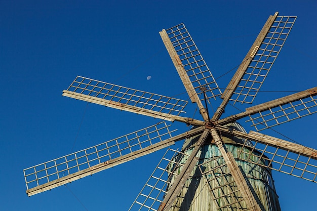 Windmill dutch type against blue sky