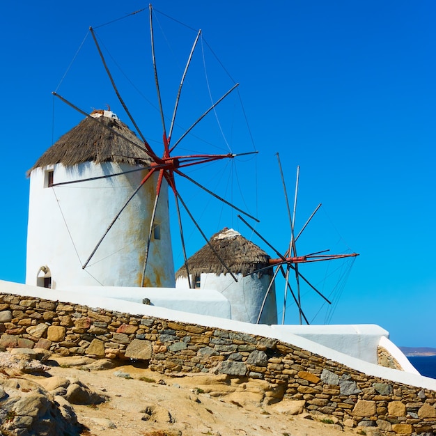 Windmills by the sea. Landmark of Mykonos island in Greece. Greek rural landscape