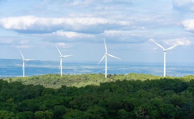 Windmills on mountain for generating electricity.  Eco power concept