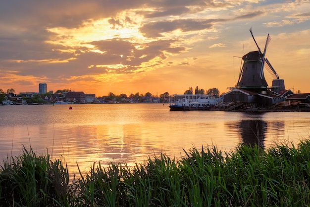 Windmills at zaanse schans in holland on sunset zaandam nether