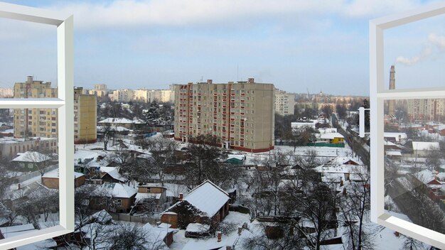 window opened to panorama of winter city