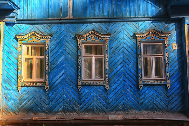 windows in an old wooden house, russian north architecture design