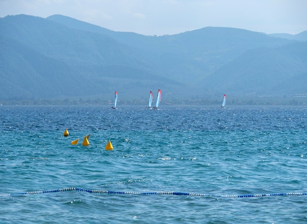 Windsurfing on a sunny day in the Aegean Sea in Greece