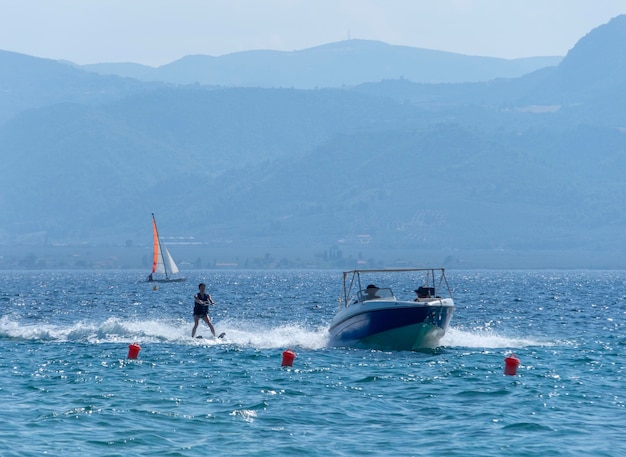 Windsurfing on a sunny day in the Aegean Sea in Greece