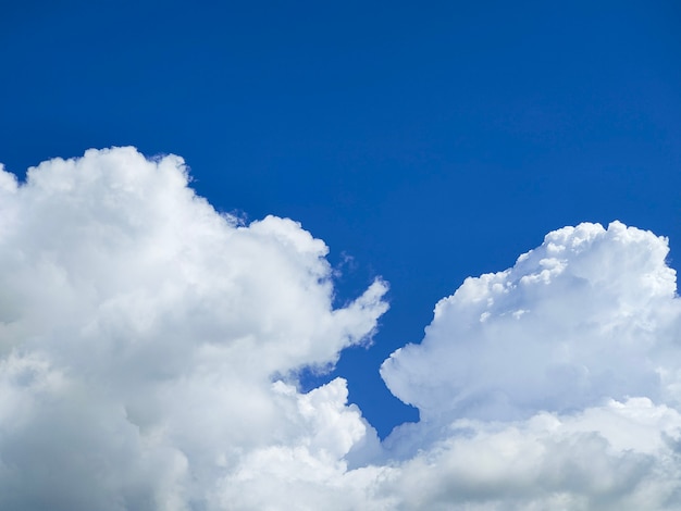 Windy clouds on blue sky