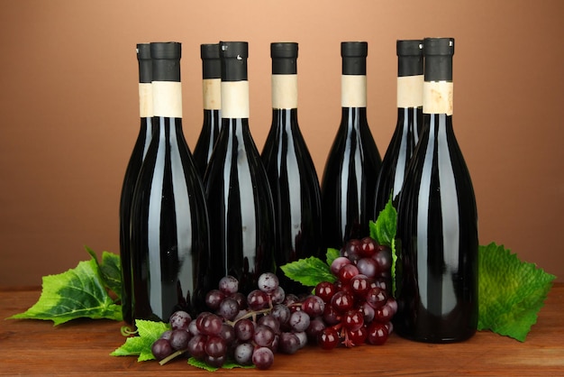 Wine bottles on brown background