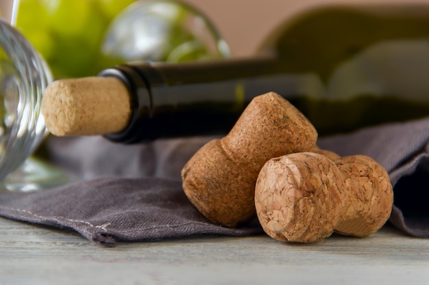 Wine bottles and glass on table 