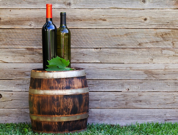 Wine bottles on wine barrel