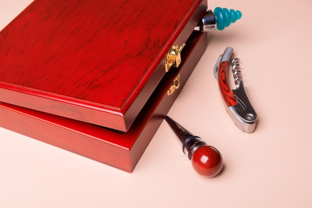 Wine corks and bottle openers set in a wooden box