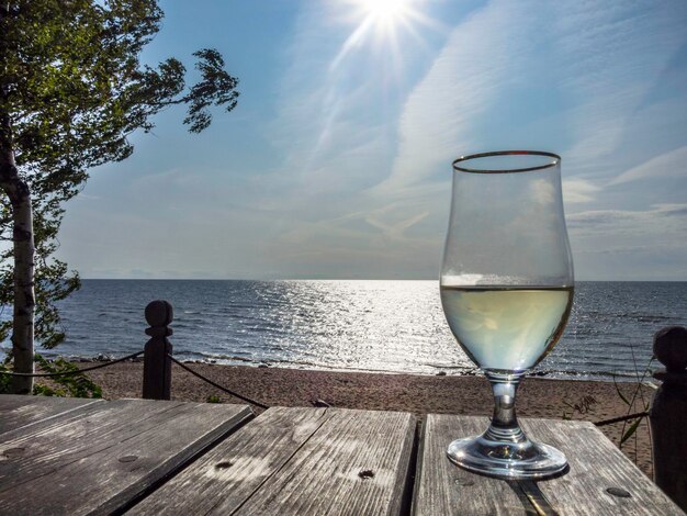 Wine glass a beautiful view on the sea toned