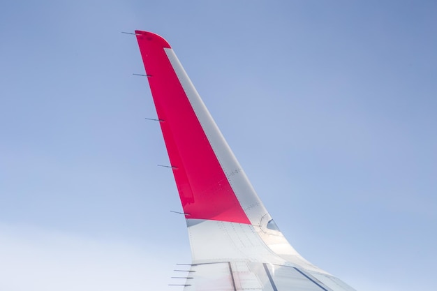 wing of an airplane seen from inside it. In the clouds