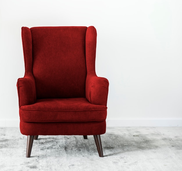 Wing back chair on a carpet no people