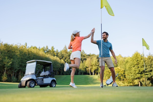 The Winning Moment Couple Celebrates Golf Victory