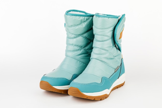 winter blue boots on a white background