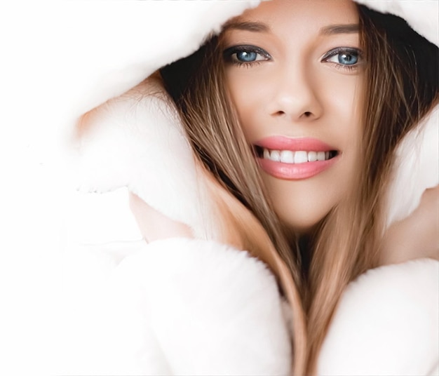 Winter fashion and beauty beautiful woman in white fur coat