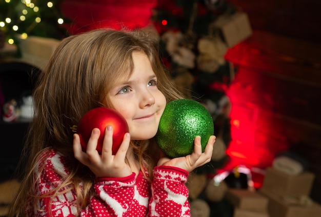 Winter holidays Happy childhood Merry christmas and happy new year Adorable child play at home Dreamy baby toddler on christmas eve Believe in christmas miracle Wish to meet santa claus