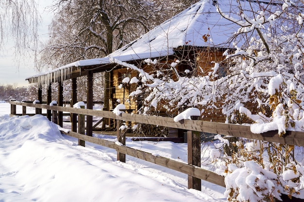 Winter house on winter snowy panoramic landscape