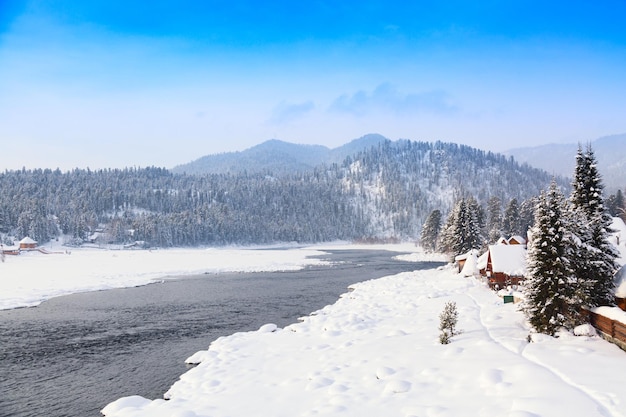 Winter landscape. Artybash village on Biya river in Altai Republic, Russia.