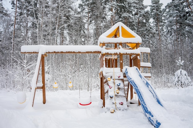 Winter landscape, snow in the forest. Home in the forest. The path in the snow. . High quality photo