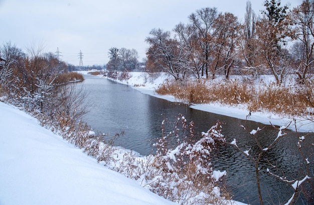 Winter landscape with a river.